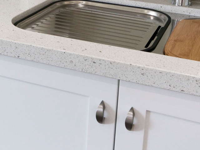 Caesarstone-benchtop-in-kitchen_undermount-sink-40mm-pencil-round-mitred-edge