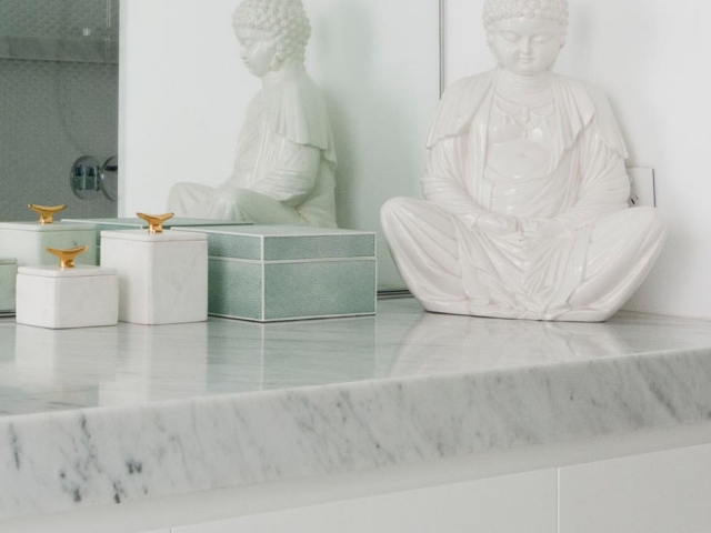 Photo of Glenn McGrath's new bathroom vanity featuring CDK Stone cararra marble benchtop, made by Benchmark Stonemasons, Sydney