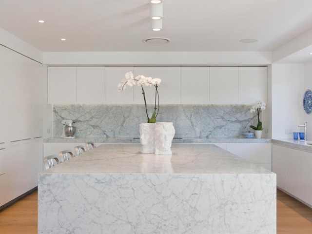 Glenn McGrath's new kitchen featuring CDK Stone cararra marble stone benchtop.