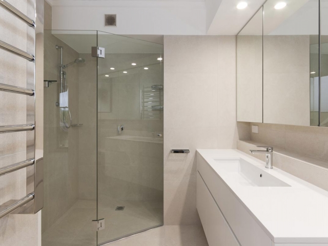 Quantum Quartz Luna White bathroom vanity benchtop. Manly apartment renovation by Reno Pack.