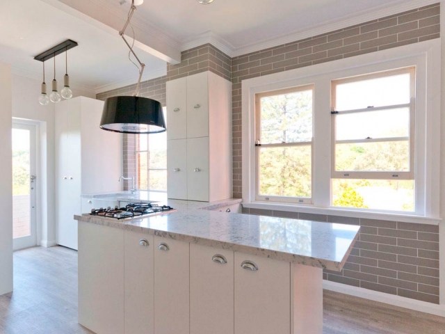 Kitchen bench featuring Silestone 40mm stone benchtop with mitred edge.